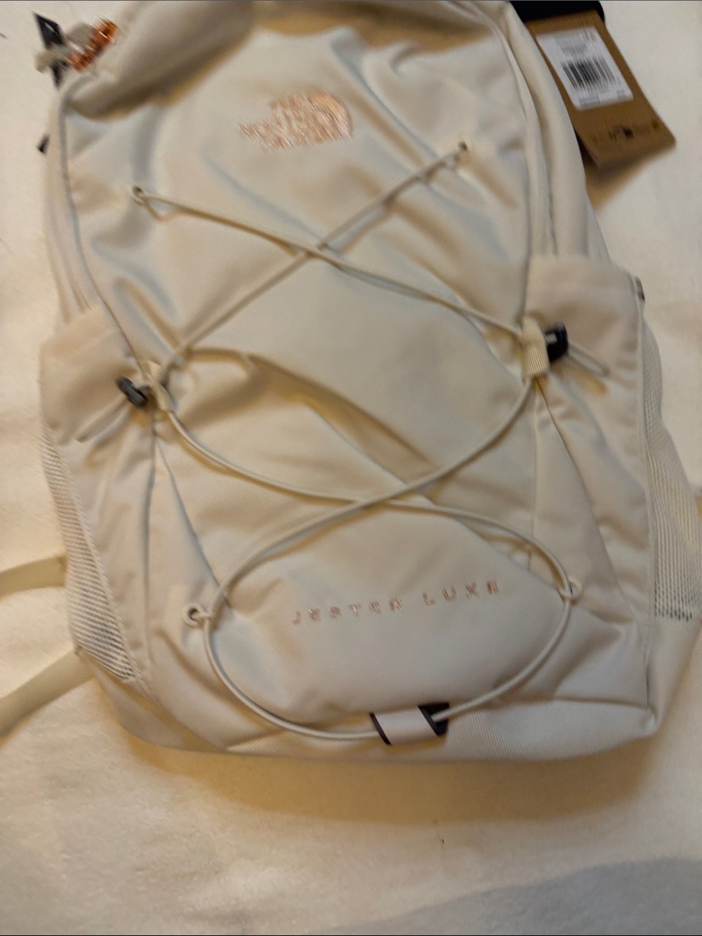 The North Face Jester Luxe Backpack in Cream with Rose-Gold Accents